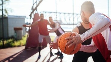 Men Playing Basketball